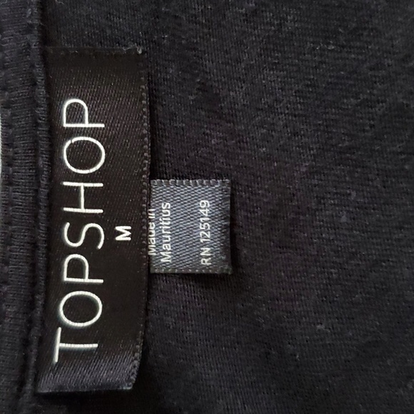 Like new, Romper black with ruffle and trim so cute split up the sides of short - Picture 6 of 7